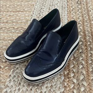 Navy Slip-On Loafers with White Soles